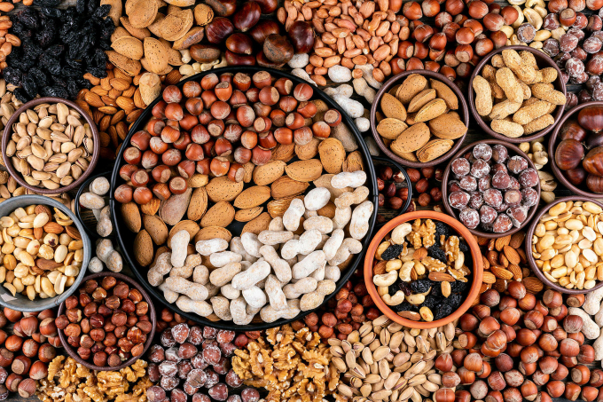 Nuts are rich in unsaturated fats, protein, fiber and other nutrients that are beneficial for the cardiovascular system.  Photo illustration by Freepik